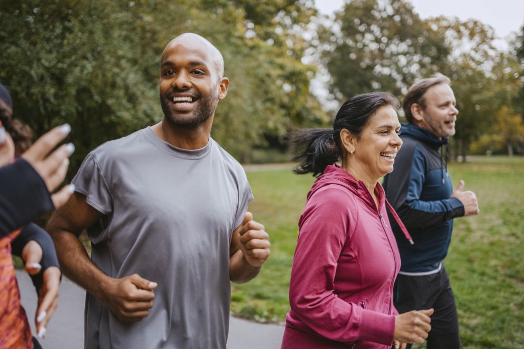 Group of people jogging outside